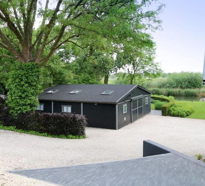 Vakantiehuis Onder De Peppel Met Sauna En Jacuzzi Wijk en Aalburg ภายนอก รูปภาพ
